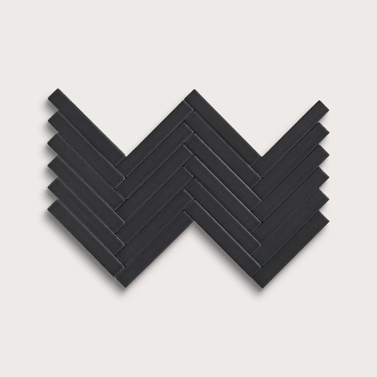Deep Black ceramic tile, 1 by 6 inch herringbone mosaic, matte finish
