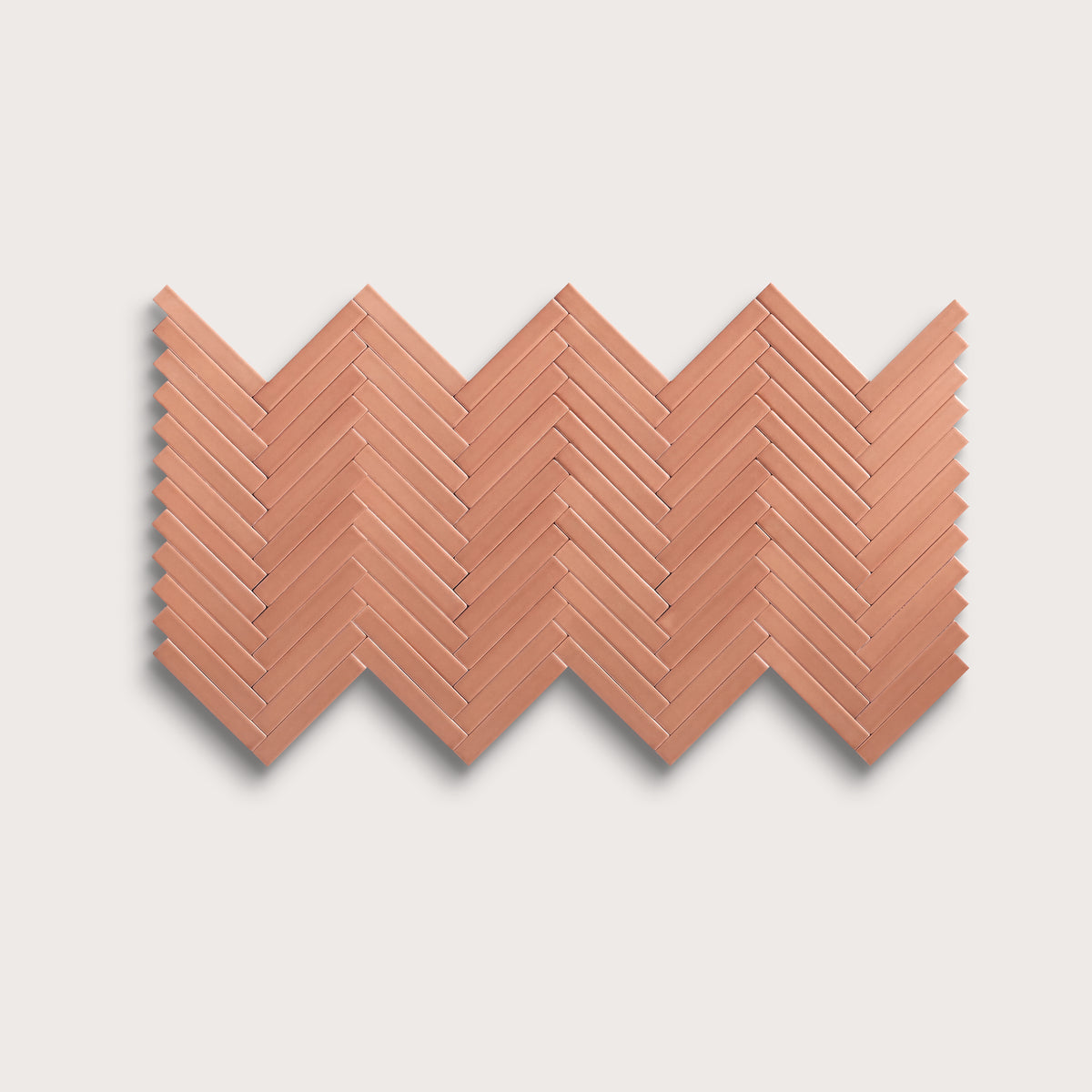Dusk ceramic tile, 1 by 6 inch herringbone mosaic, matte finish