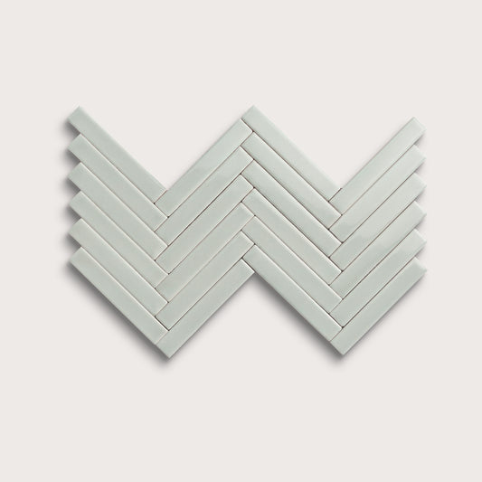 Echo ceramic tile, 1 by 6 inch herringbone mosaic, gloss finish