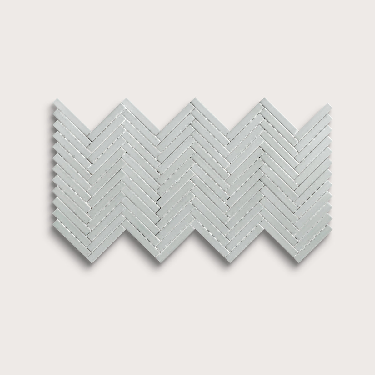 Echo ceramic tile, 1 by 6 inch herringbone mosaic, matte finish