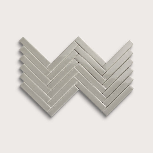 Fog ceramic tile, 1 by 6 inch herringbone mosaic, gloss finish