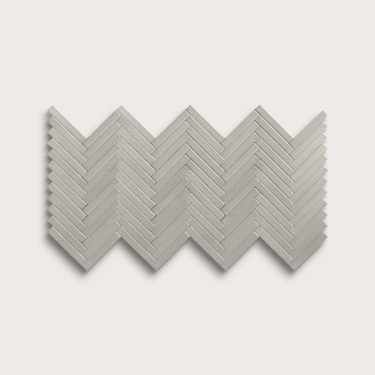 Fog ceramic tile, 1 by 6 inch herringbone mosaic, matte finish