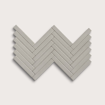 Fog ceramic tile, 1 by 6 inch herringbone mosaic, matte finish