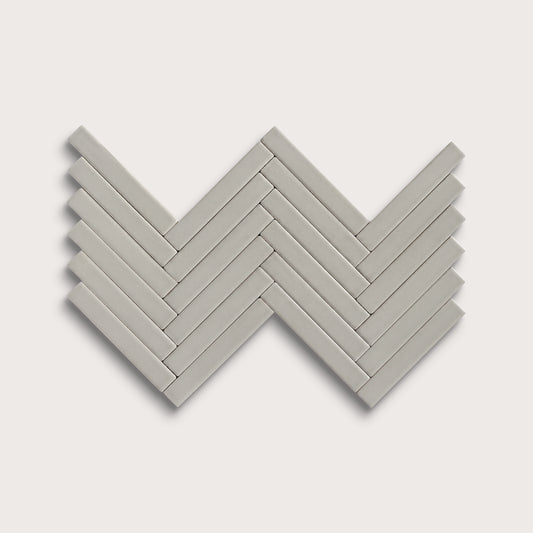 Fog ceramic tile, 1 by 6 inch herringbone mosaic, matte finish