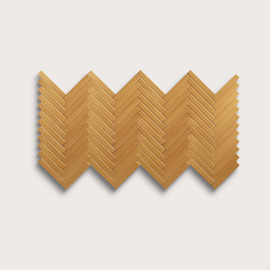 Gambol Gold ceramic tile, 1 by 6 inch herringbone mosaic, matte finish