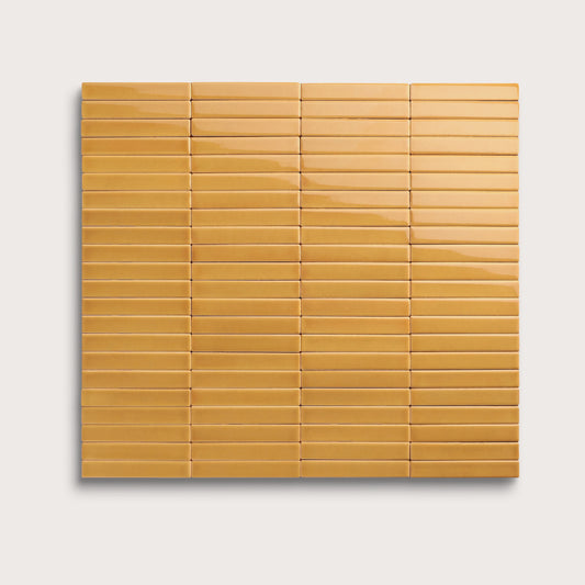 Gambol Gold ceramic tile, 1 by 6 inch stacked mosaic, gloss finish