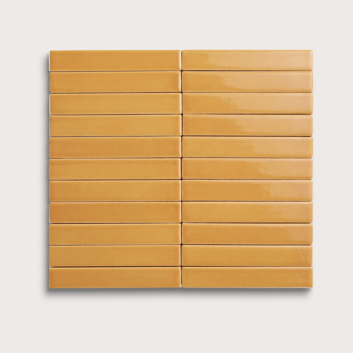 Gambol Gold ceramic tile, 1 by 6 inch stacked mosaic, gloss finish