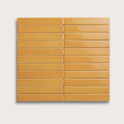 Gambol Gold ceramic tile, 1 by 6 inch stacked mosaic, gloss finish
