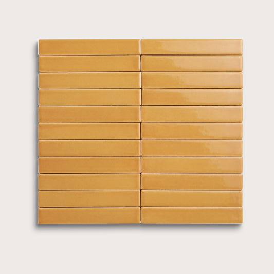 Gambol Gold ceramic tile, 1 by 6 inch stacked mosaic, gloss finish