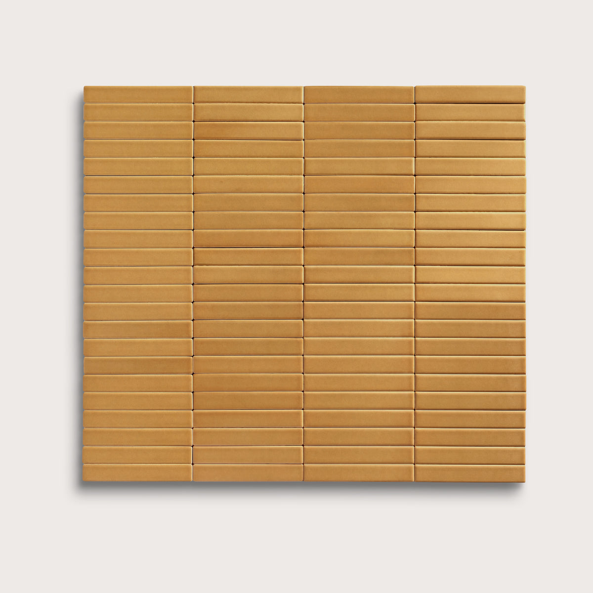 Gambol Gold ceramic tile, 1 by 6 inch stacked mosaic, matte finish