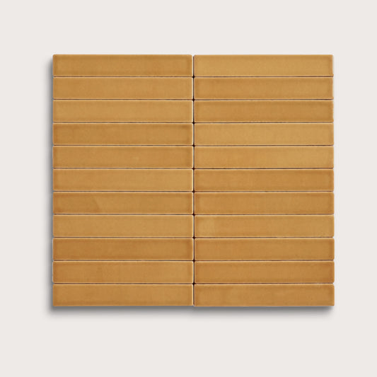 Gambol Gold ceramic tile, 1 by 6 inch stacked mosaic, matte finish