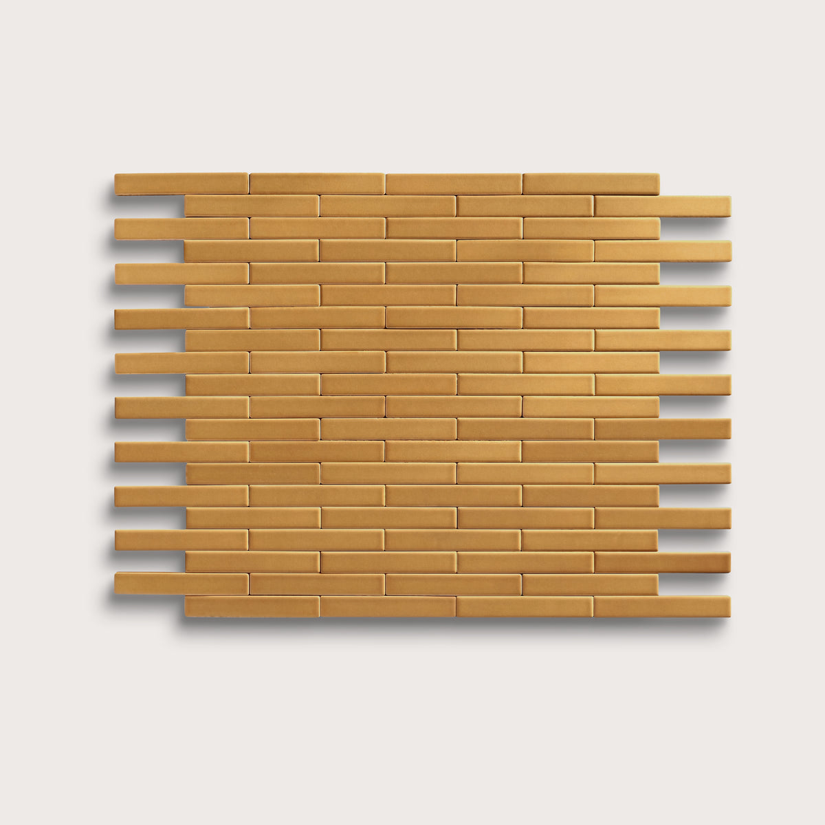 Gambol Gold ceramic tile, 1 by 6 inch subway mosaic, matte finish