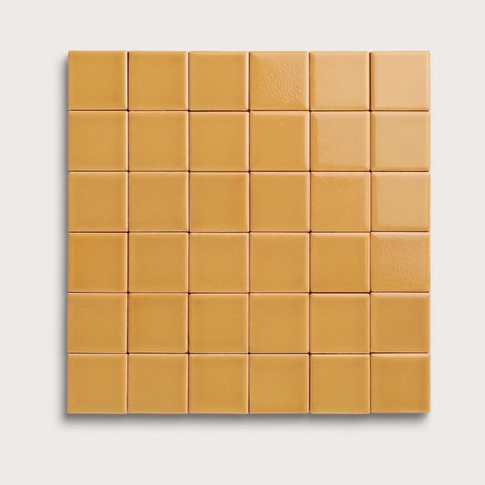 Gambol Gold ceramic tile, 2 by 2 inch mosaic, gloss finish