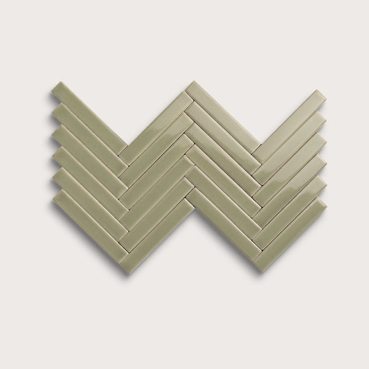 Ghetty Green ceramic tile, 1 by 6 inch herringbone mosaic, gloss finish