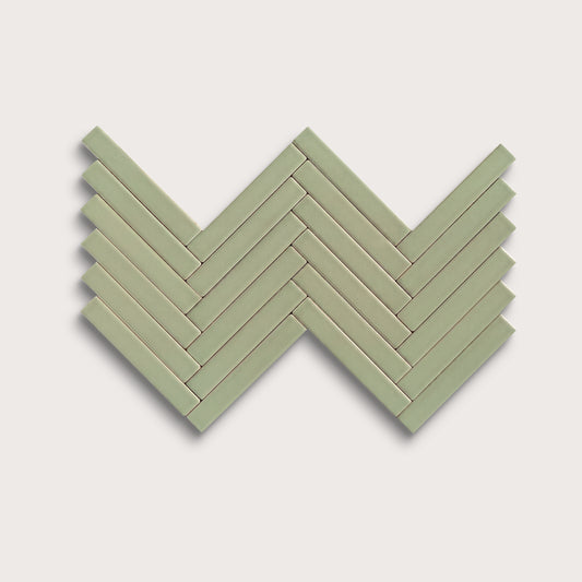 Ghetty Green ceramic tile, 1 by 6 inch herringbone mosaic, matte finish