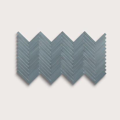 Grey Street ceramic tile, 1 by 6 inch herringbone mosaic, matte finish