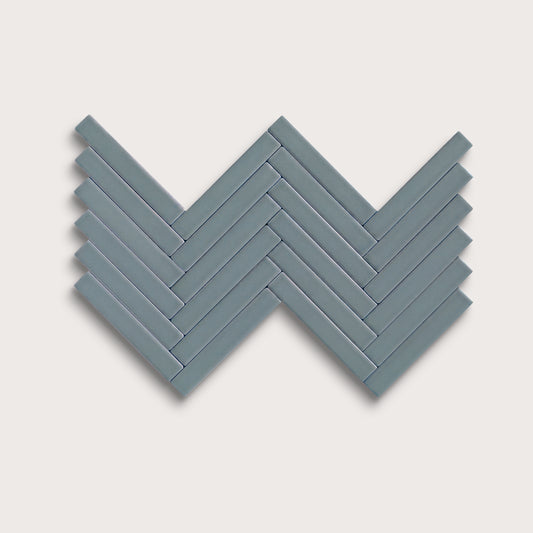 Grey Street ceramic tile, 1 by 6 inch herringbone mosaic, matte finish