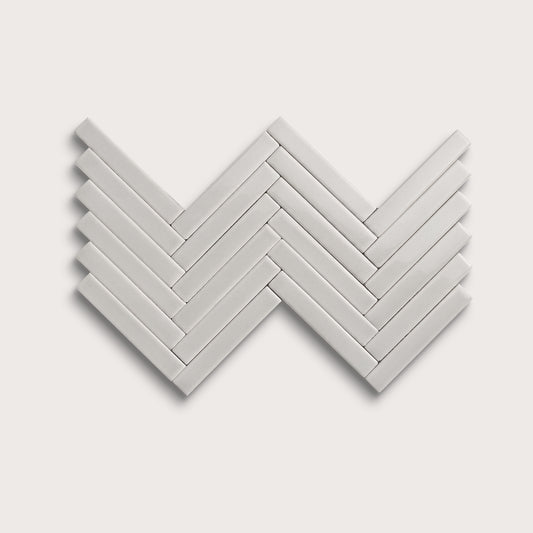 Haze ceramic tile, 1 by 6 inch herringbone mosaic, gloss finish
