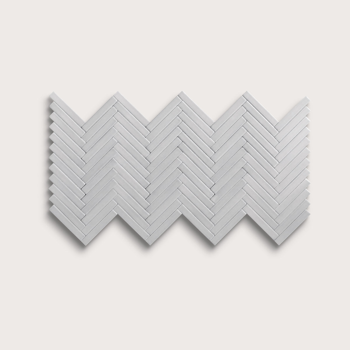 Haze ceramic tile, 1 by 6 inch herringbone mosaic, matte finish