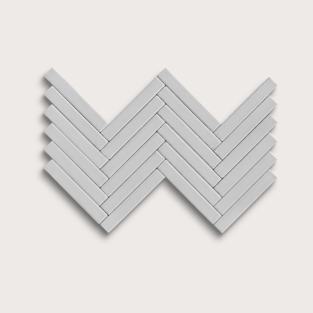 Haze ceramic tile, 1 by 6 inch herringbone mosaic, matte finish