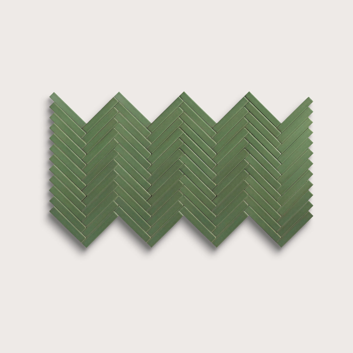 Kale ceramic tile, 1 by 6 inch herringbone mosaic, matte finish