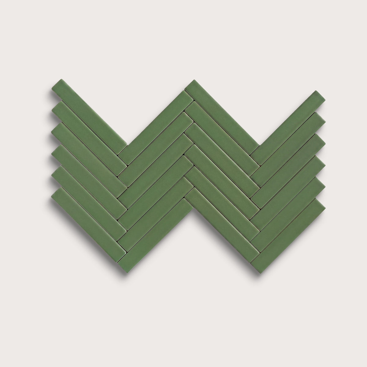 Kale ceramic tile, 1 by 6 inch herringbone mosaic, matte finish