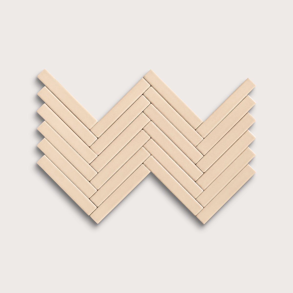 Latte ceramic tile, 1 by 6 inch herringbone mosaic, matte finish