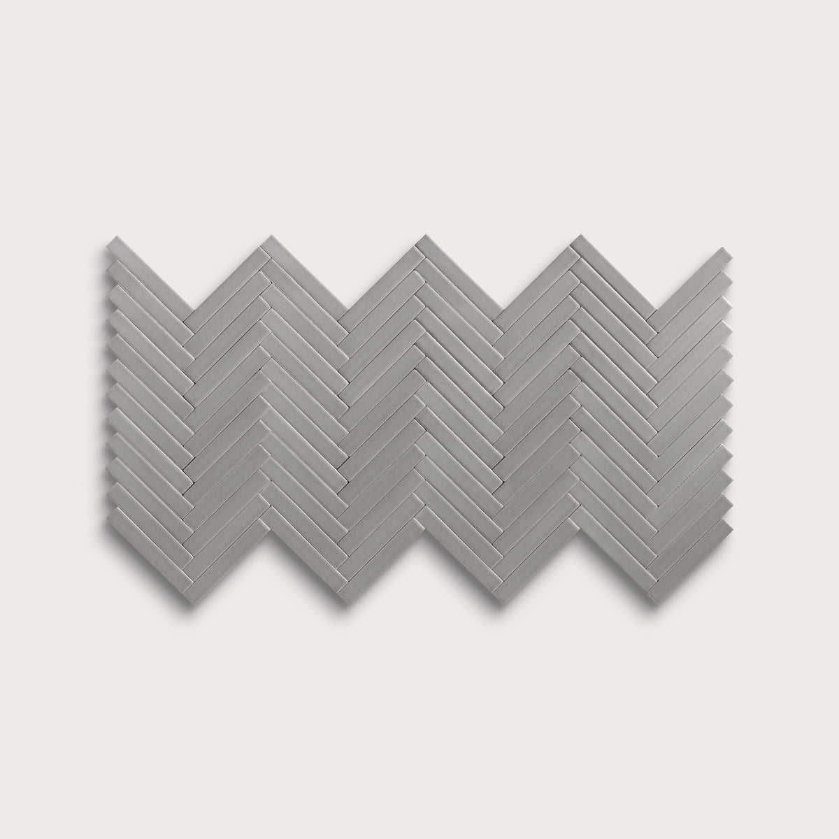 Lunar ceramic tile, 1 by 6 inch herringbone mosaic, matte finish