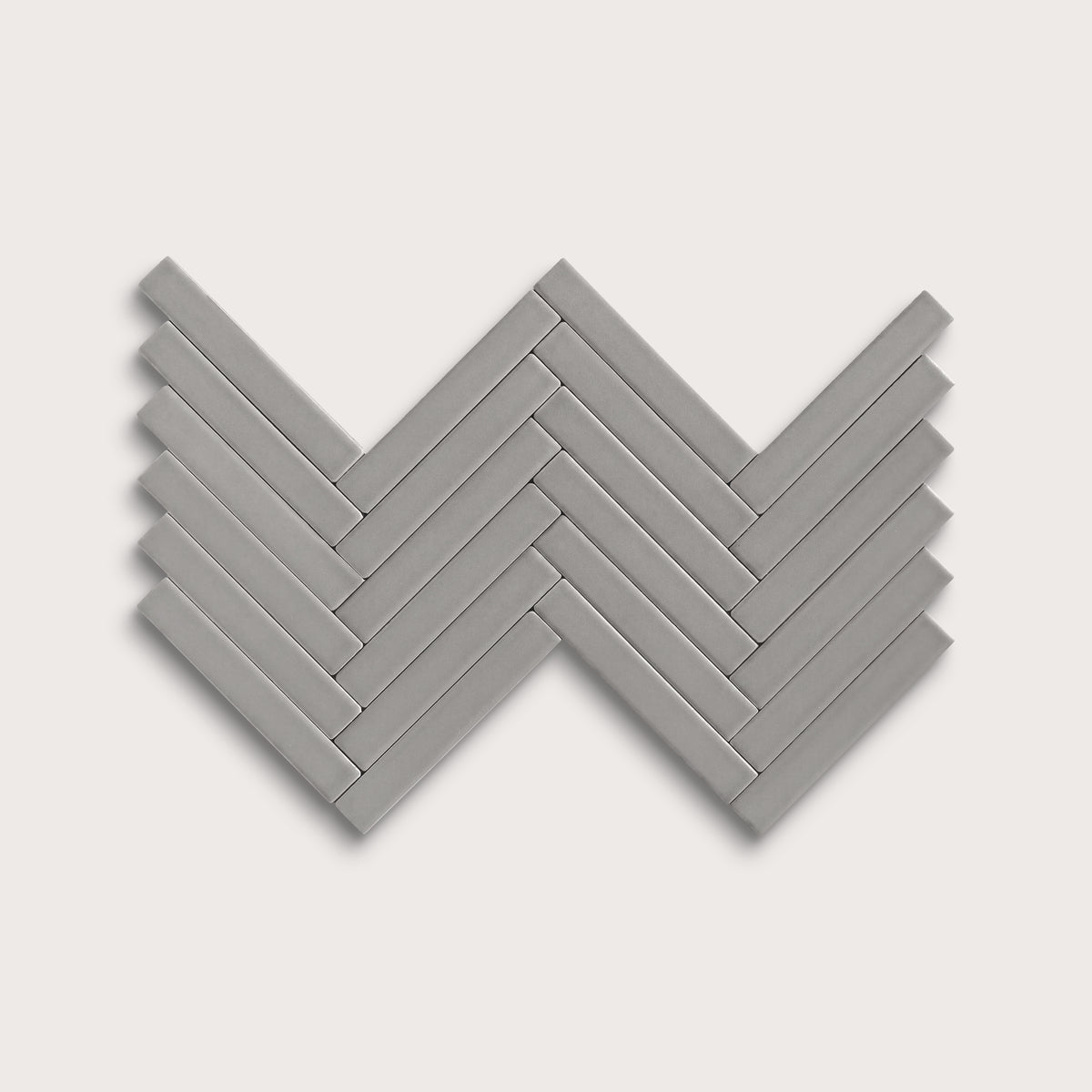 Lunar ceramic tile, 1 by 6 inch herringbone mosaic, matte finish