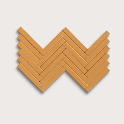 Marigold ceramic tile, 1 by 6 inch herringbone mosaic, matte finish