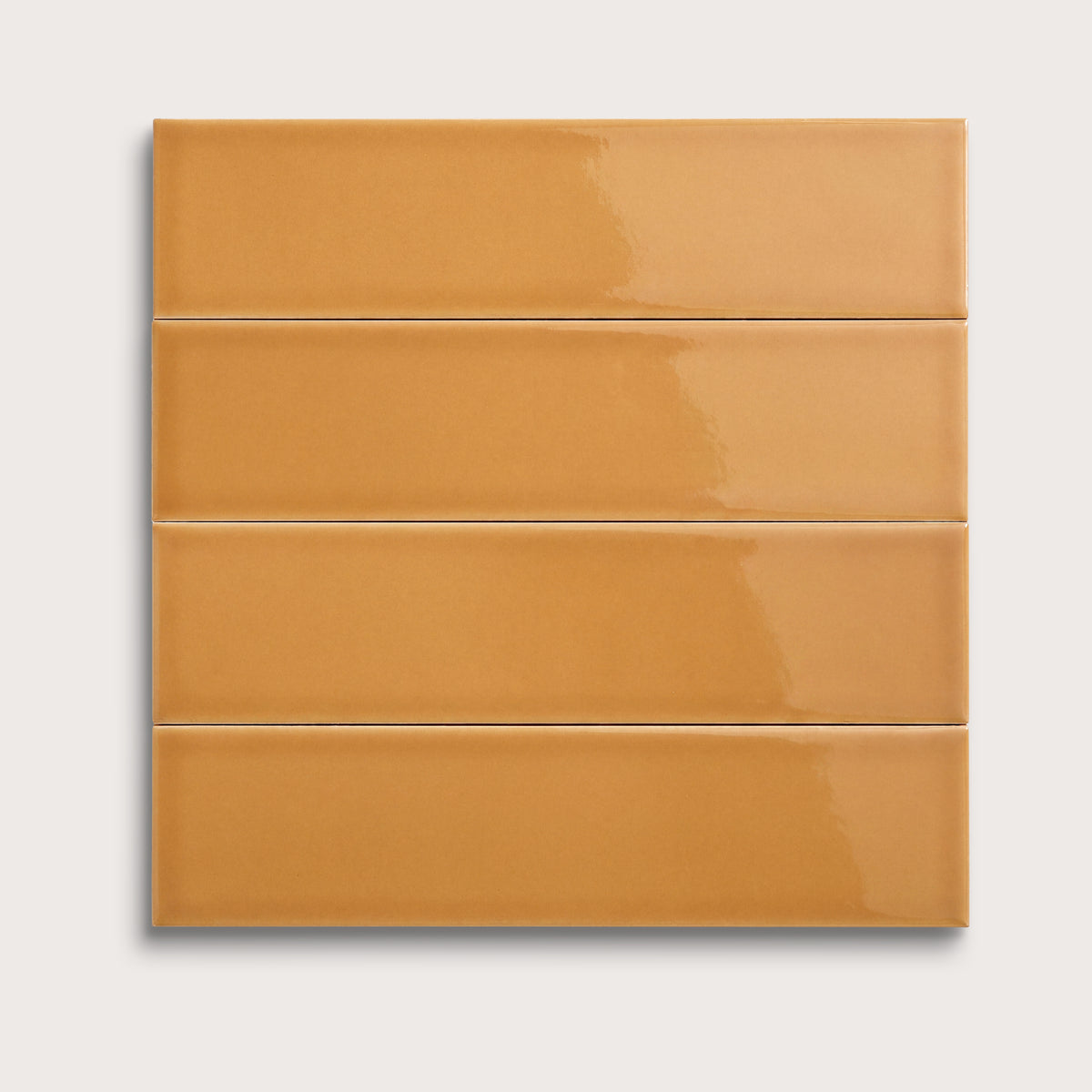 Marigold ceramic tile, 3 by 12 inches, gloss finish