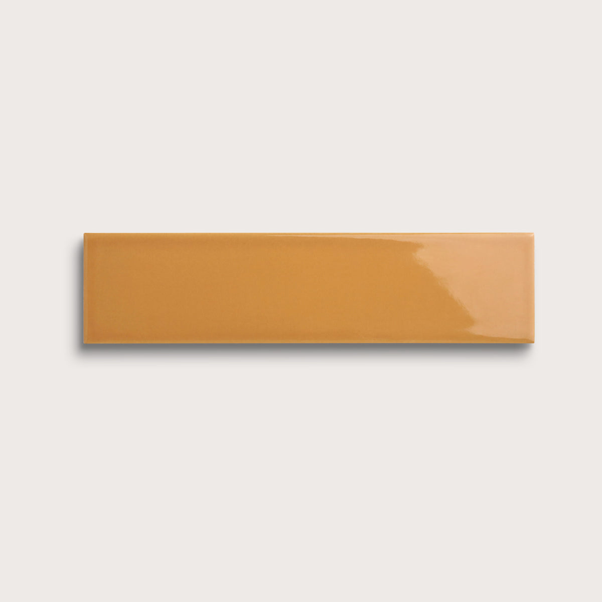 Marigold ceramic tile, 3 by 12 inches, gloss finish
