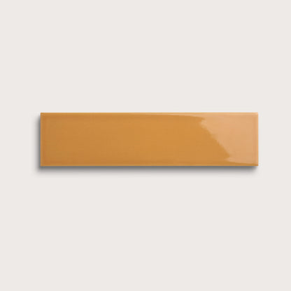 Marigold ceramic tile, 3 by 12 inches, gloss finish