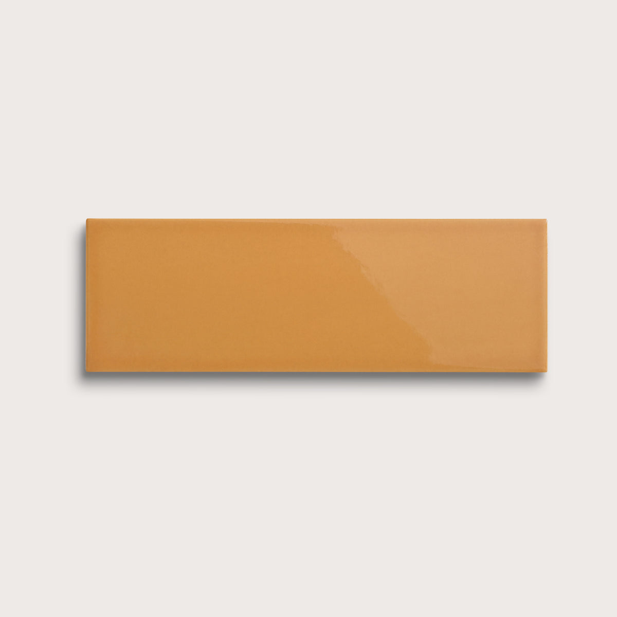 Marigold ceramic tile, 4 by 12 inches, gloss finish
