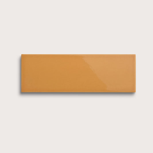 Marigold ceramic tile, 4 by 12 inches, gloss finish