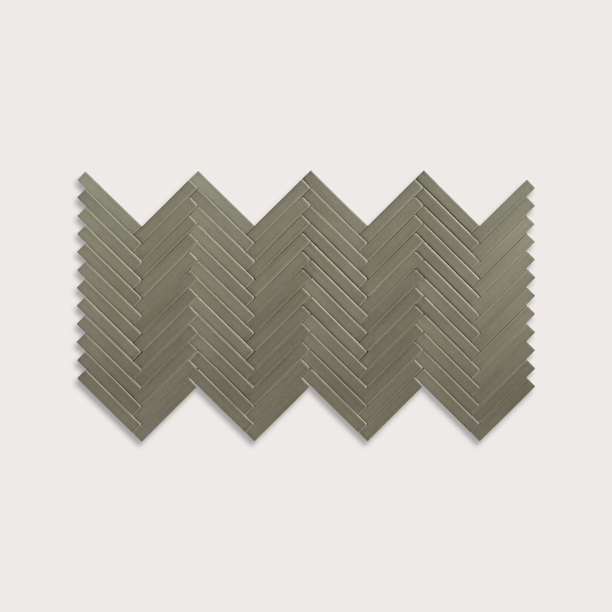 Moss ceramic tile, 1 by 6 inch herringbone mosaic, matte finish