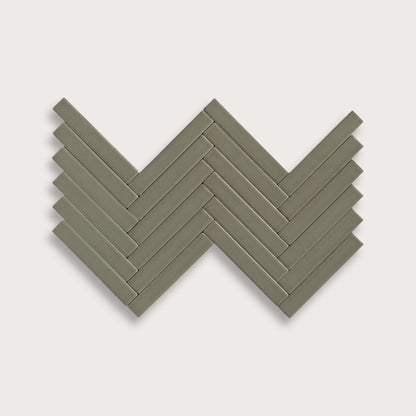 Moss ceramic tile, 1 by 6 inch herringbone mosaic, matte finish