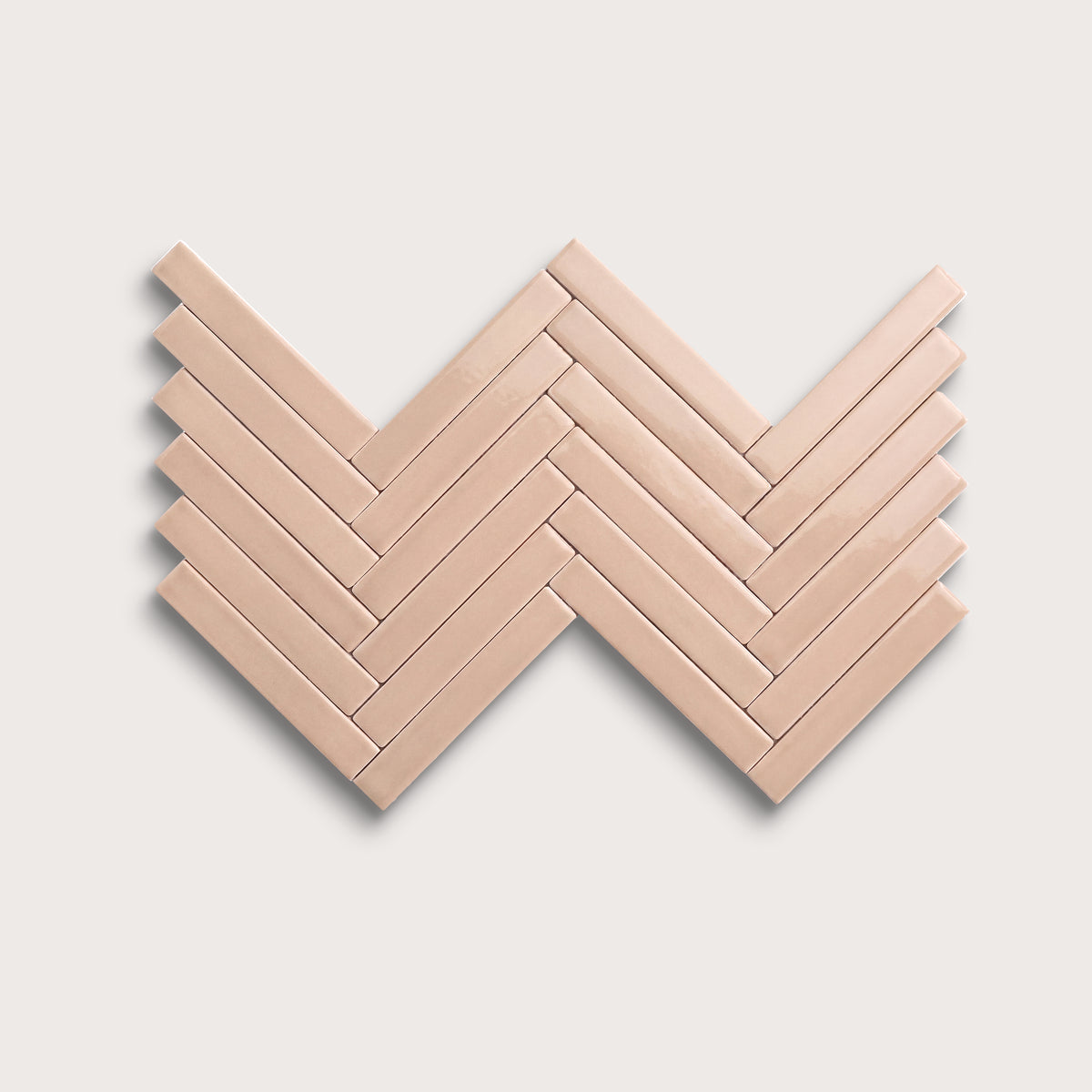 Petal ceramic tile, 1 by 6 inch herringbone mosaic, gloss finish