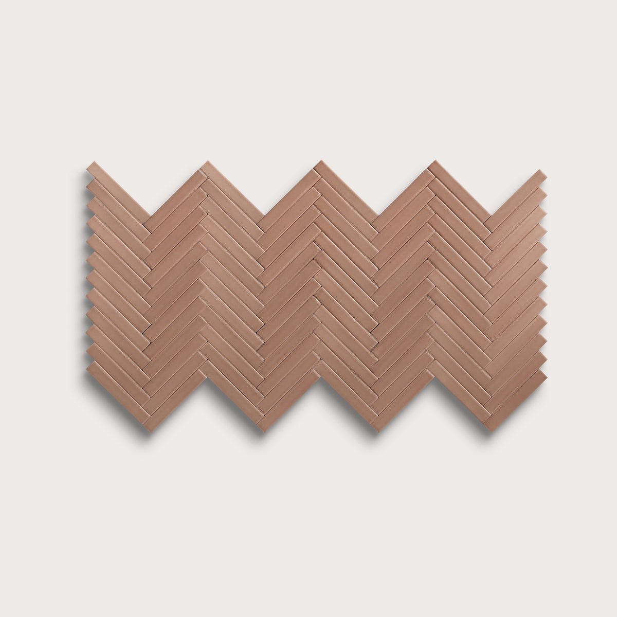 Petal ceramic tile, 1 by 6 inch herringbone mosaic, matte finish