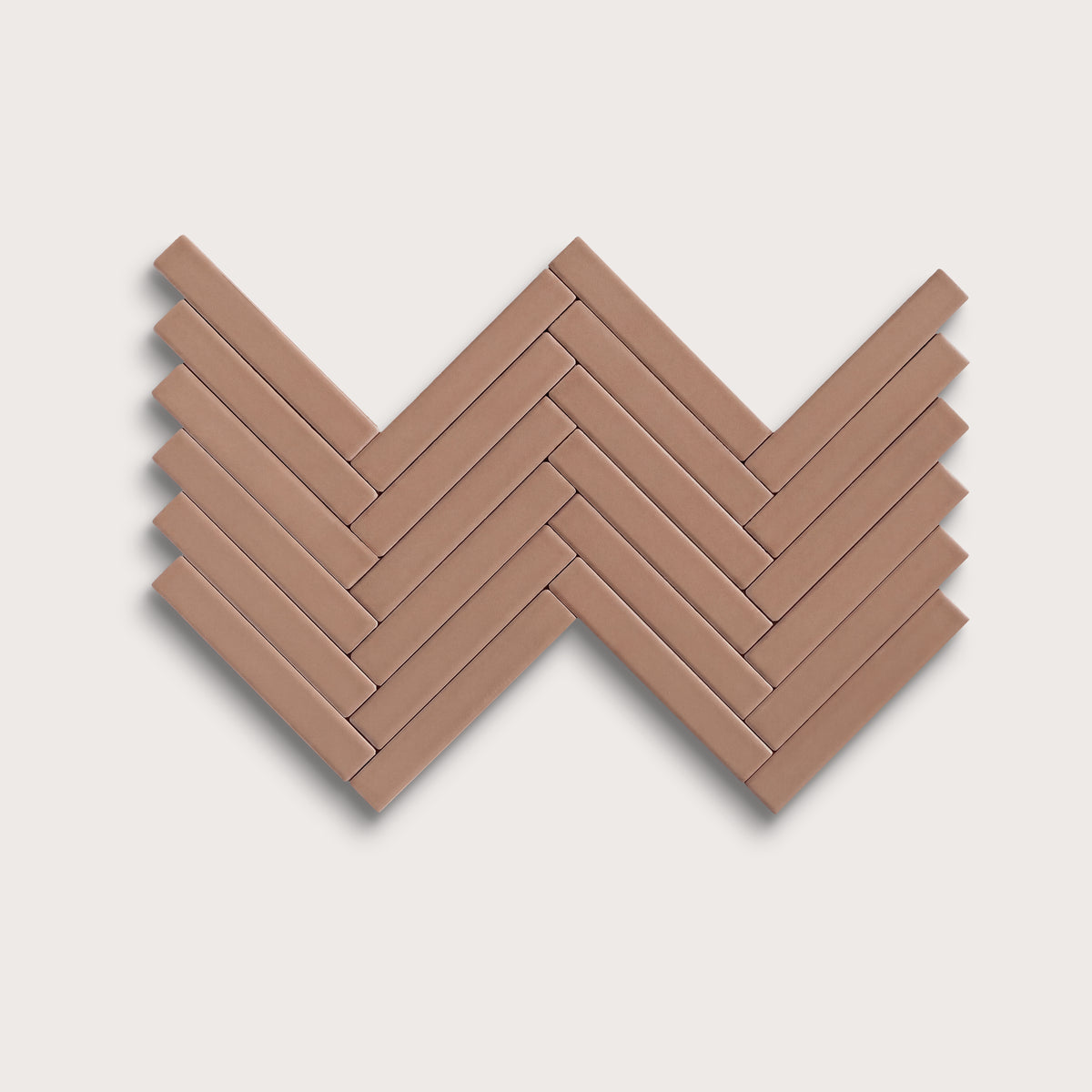Petal ceramic tile, 1 by 6 inch herringbone mosaic, matte finish