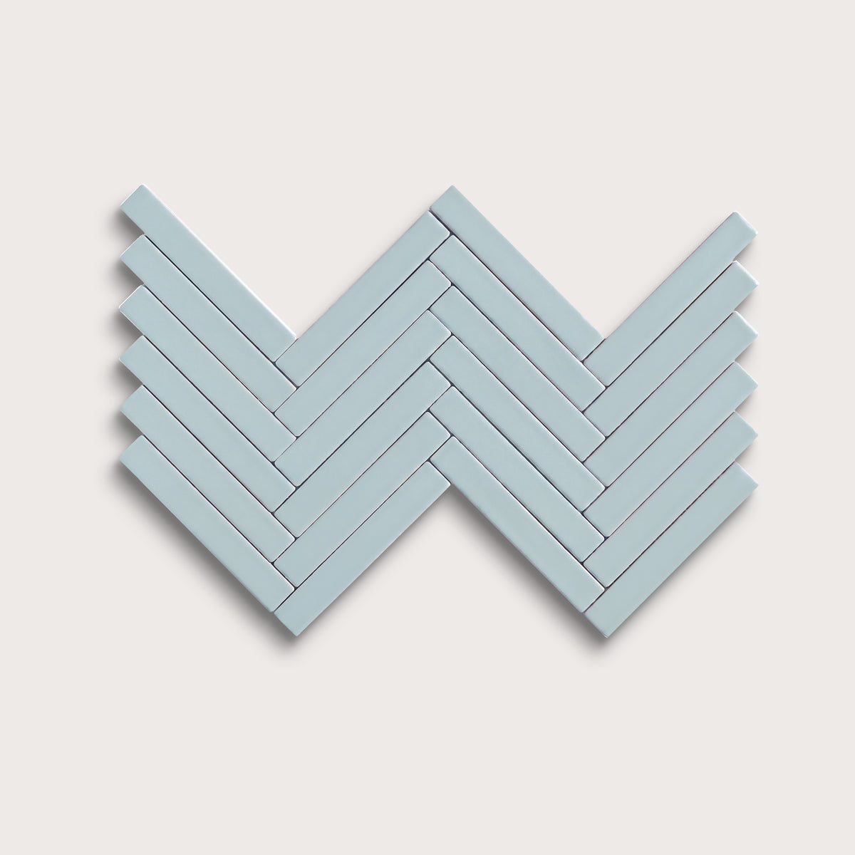 Powder Blue ceramic tile, 1 by 6 inch herringbone mosaic, matte finish