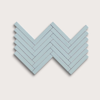 Powder Blue ceramic tile, 1 by 6 inch herringbone mosaic, matte finish