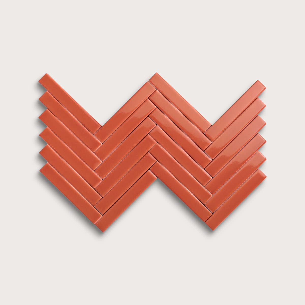 Punch ceramic tile, 1 by 6 inch herringbone mosaic, gloss finish