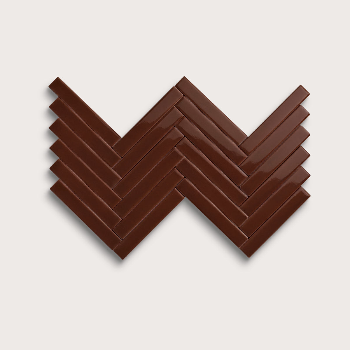 Red Red Wine ceramic tile, 1 by 6 inch herringbone mosaic, gloss finish