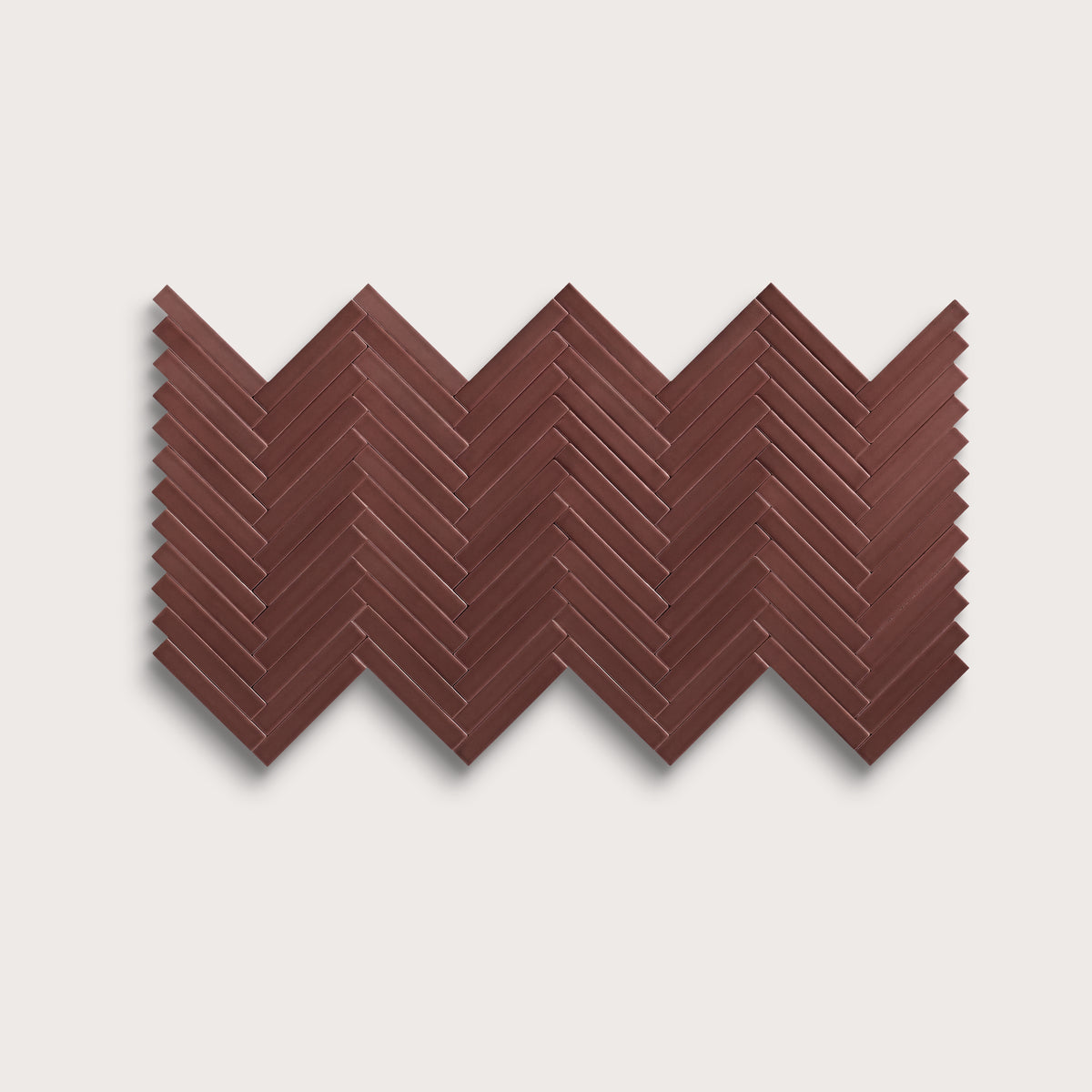 Red Red Wine ceramic tile, 1 by 6 inch herringbone mosaic, matte finish