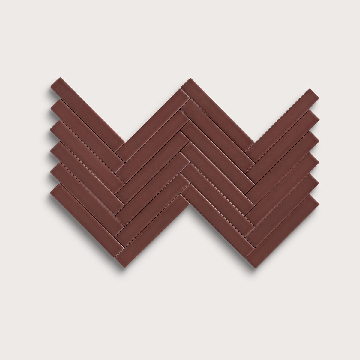 Red Red Wine ceramic tile, 1 by 6 inch herringbone mosaic, matte finish