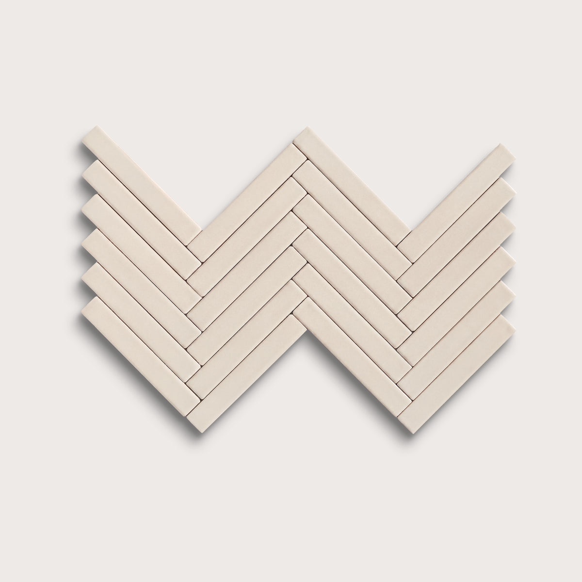 Shell ceramic tile, 1 by 6 inch herringbone mosaic, matte finish