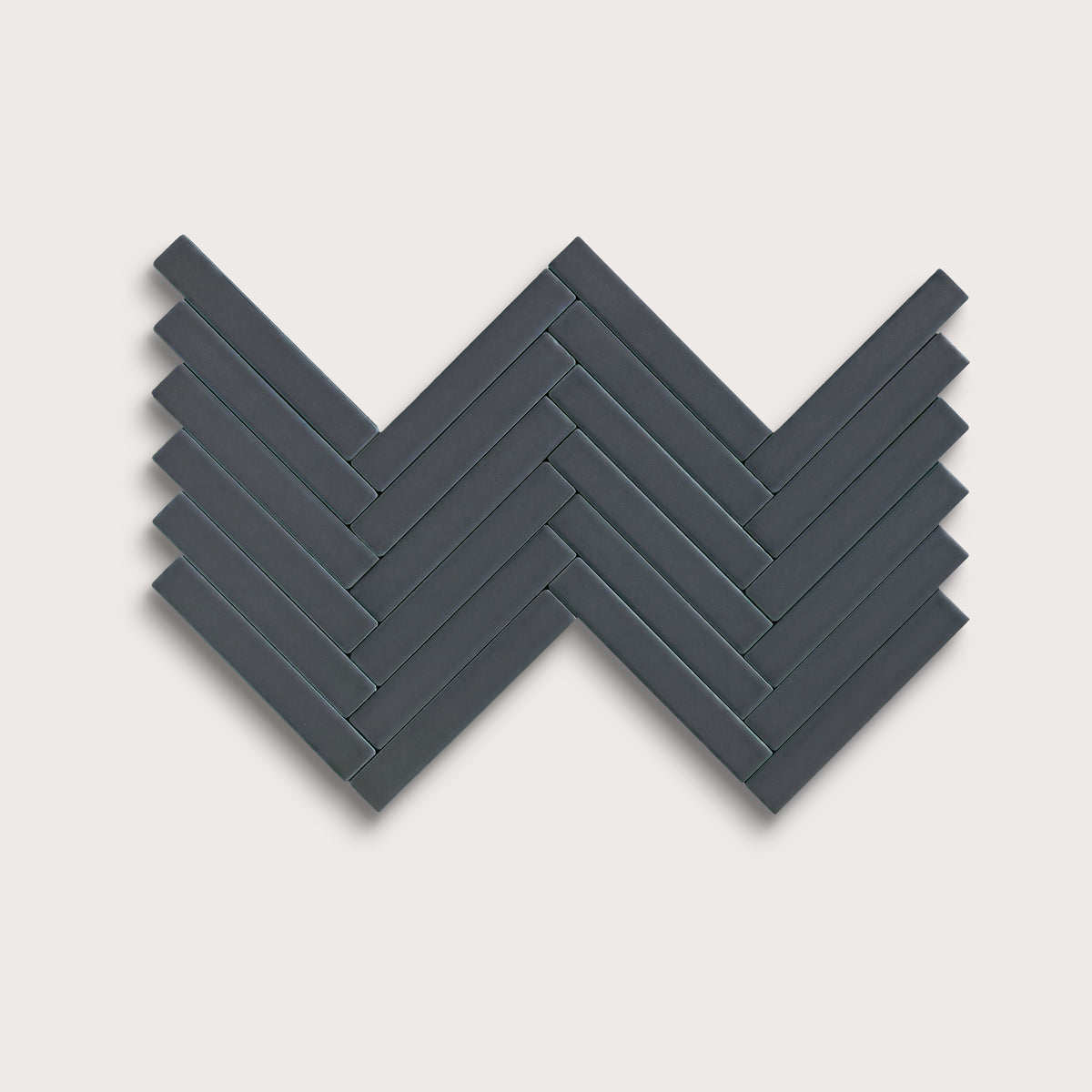 Smoke ceramic tile, 1 by 6 inch herringbone mosaic, matte finish