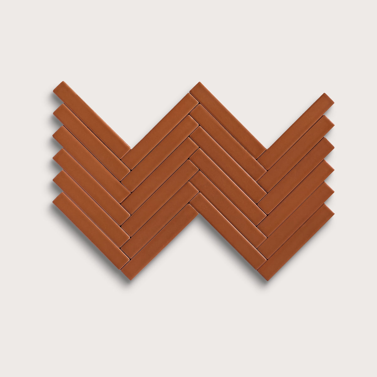 Saddle ceramic tile, 1 by 6 inch herringbone mosaic, matte finish
