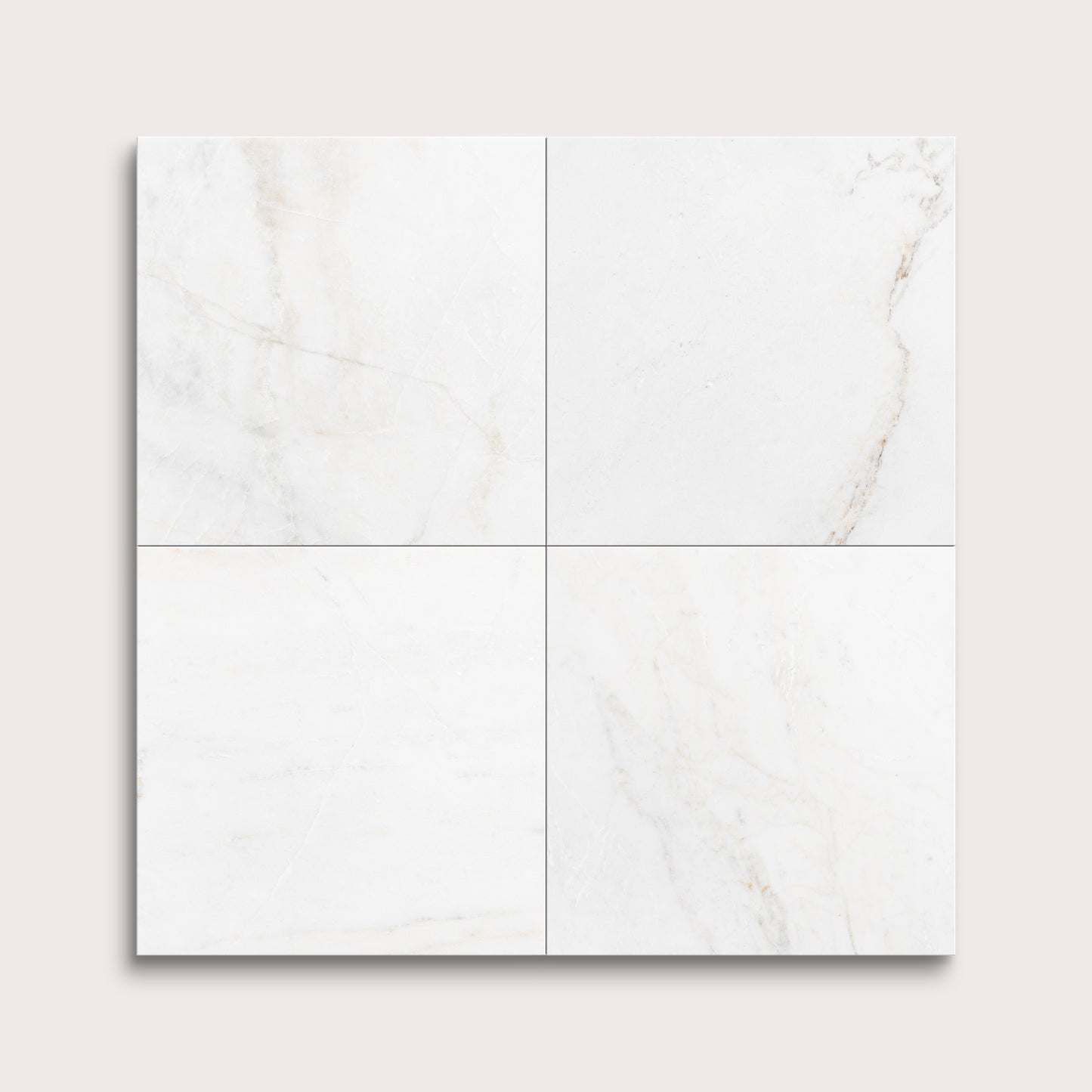 casablanca gold White marble tiles arranged in a grid pattern on a light gray background